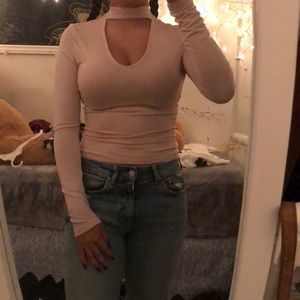 Long sleeve tee with cutout chest. Worn once.